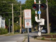 Safety signage at a suburban crossing on the IHB mainline