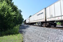 Having passed an eastbound sitting on the main, 255 is about a carlength away from knocking down the signal at the west end of Colburn siding